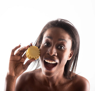 Geranium and Patchouli Natural Soap 60g with model holding