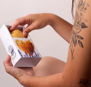 Woman holding a Lavender, Ylang Ylang and Lemon Bath Bomb - Heart Shape 200g