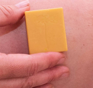 A small lotion bar from Flor y Amor's travel pack