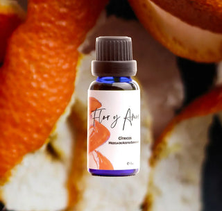 Citrus Essential Oil Blend from Flor y Amor - 18ml with orange peel background