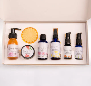 A boxed Flor y Amor facial ritual with pomegrate face mask and face oil.